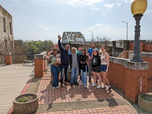 Tourists in front of the Edmund Pettus Bridge