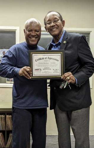 Mayor George Evans presenting Terry Chestnut with an award